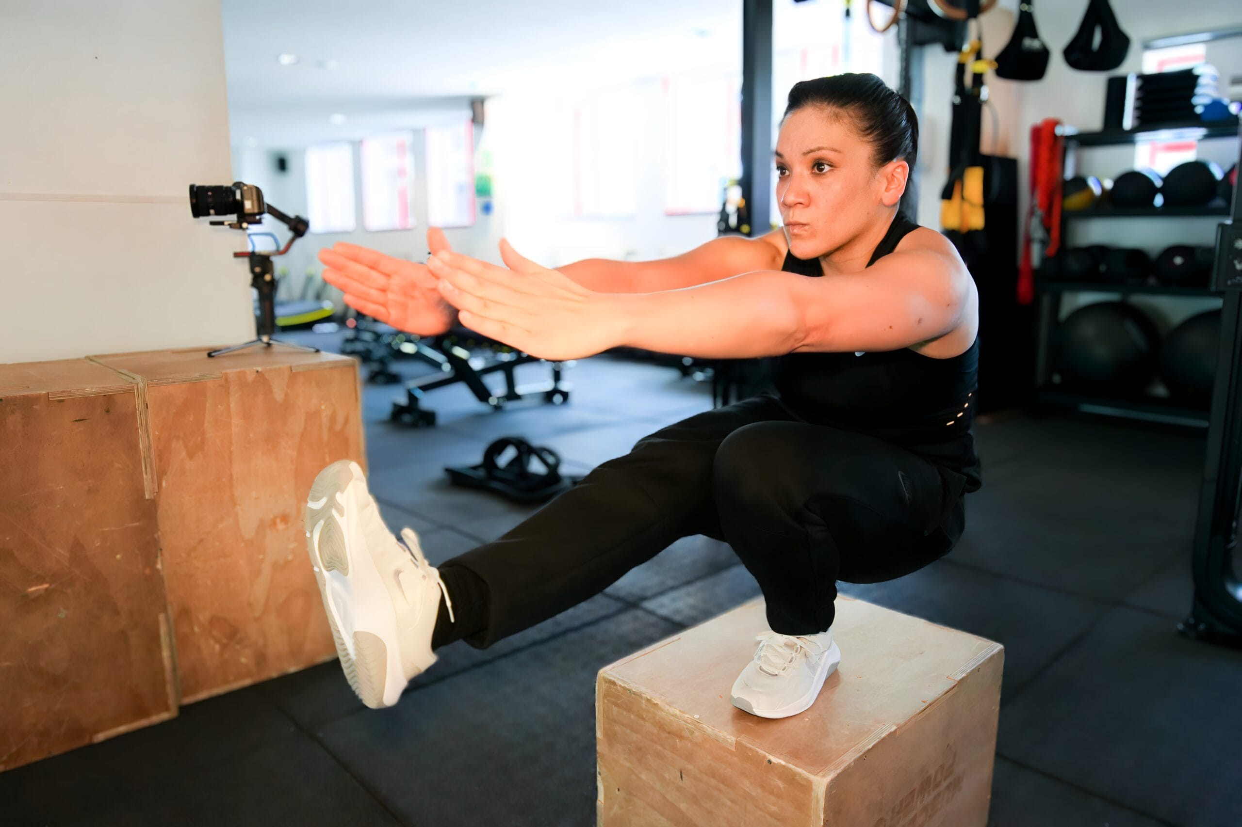 Person does pistol squat workout