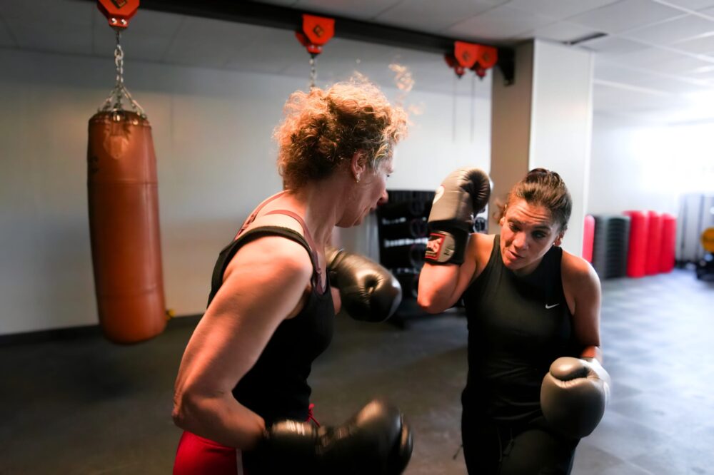Sparring during boxing training